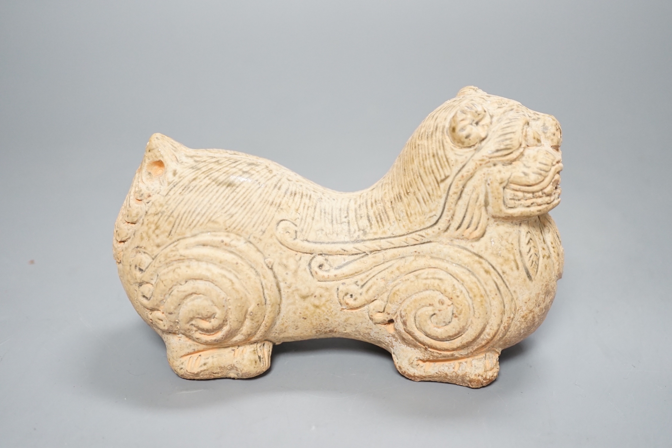 A Chinese green glazed 'lion-dog' - 15.5cm